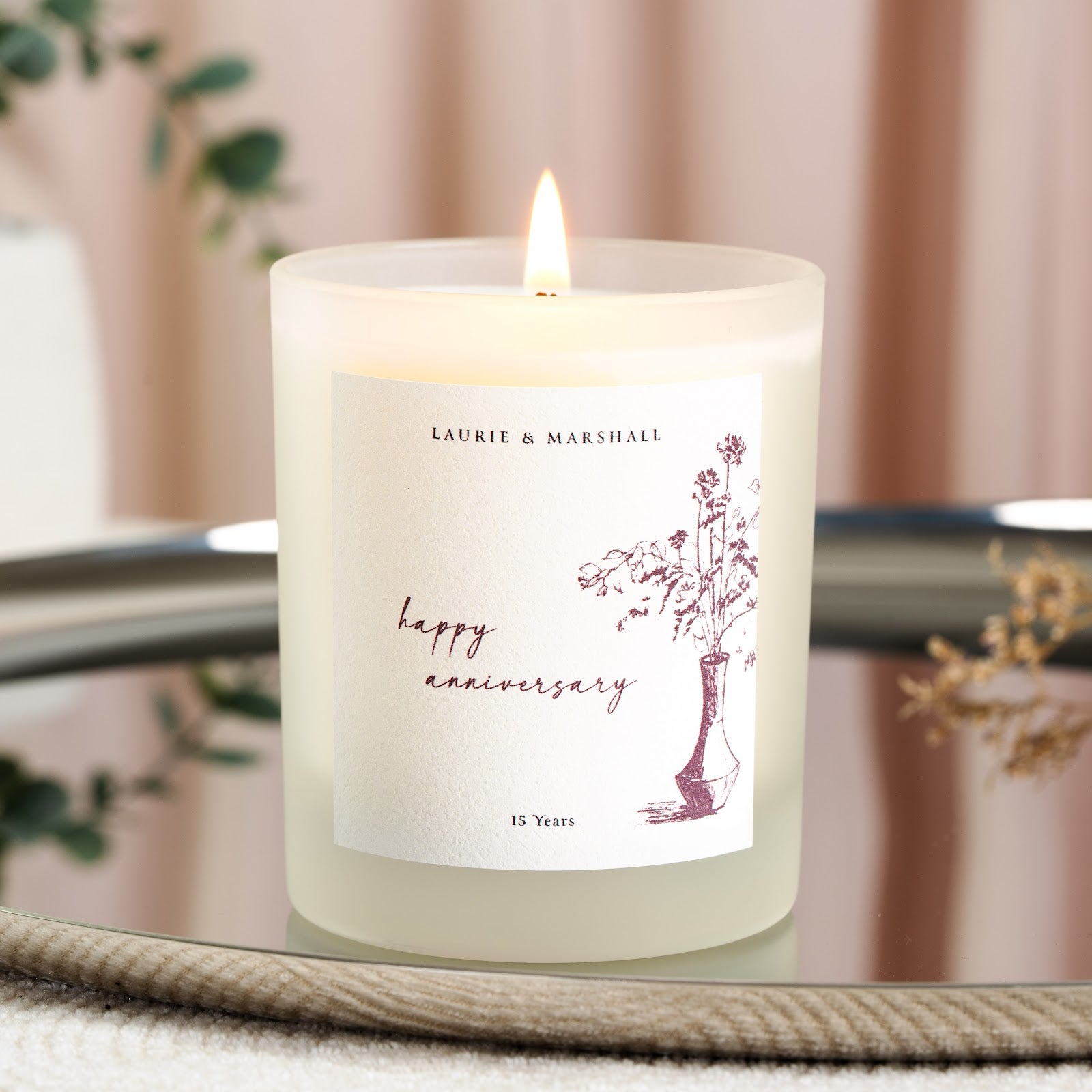 Floral vase illustration above the years together on a personalised anniversary candle