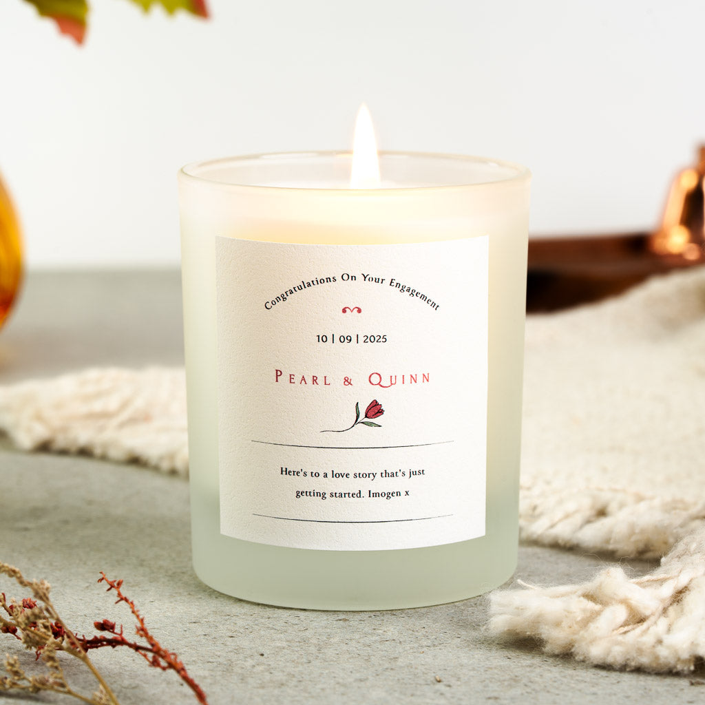 Personalised engagement candle with a single tulip illustration set between two rules
