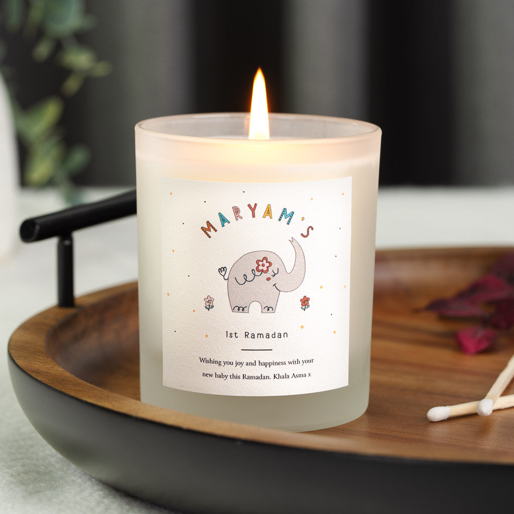 Personalised first Ramadan candle with a grey elephant and a small pink flower