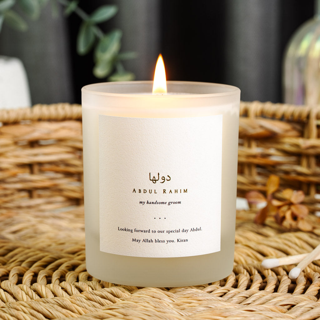 Personalised Islamic wedding candle with gold-toned Urdu script above the husband's name