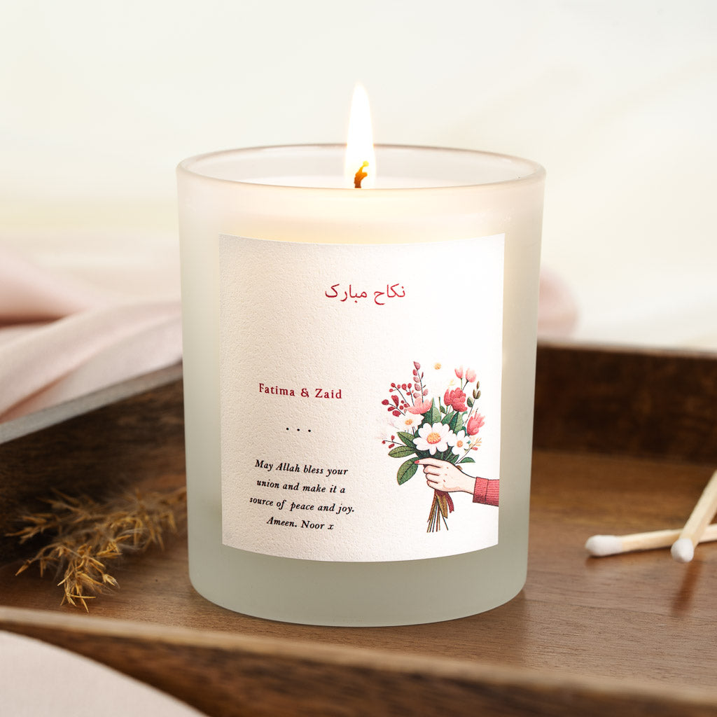 Personalised nikah candle with an Arabic nikah mubarak phrase in red script