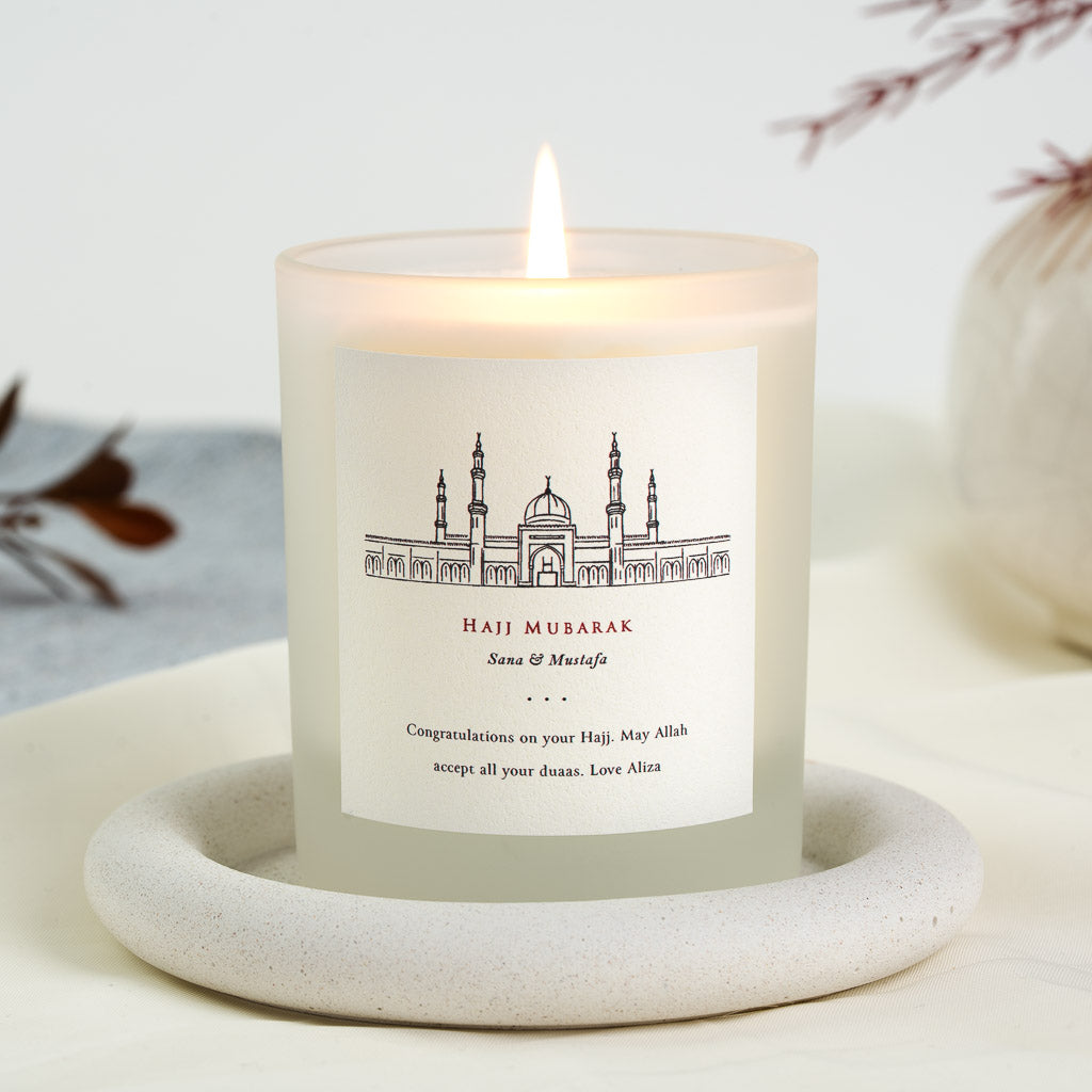 Personalised Hajj candle with a masjid in delicate red and blue line work