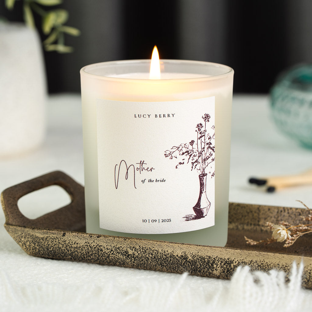 Personalised mother of the bride candle with a brown ink vase of wildflowers