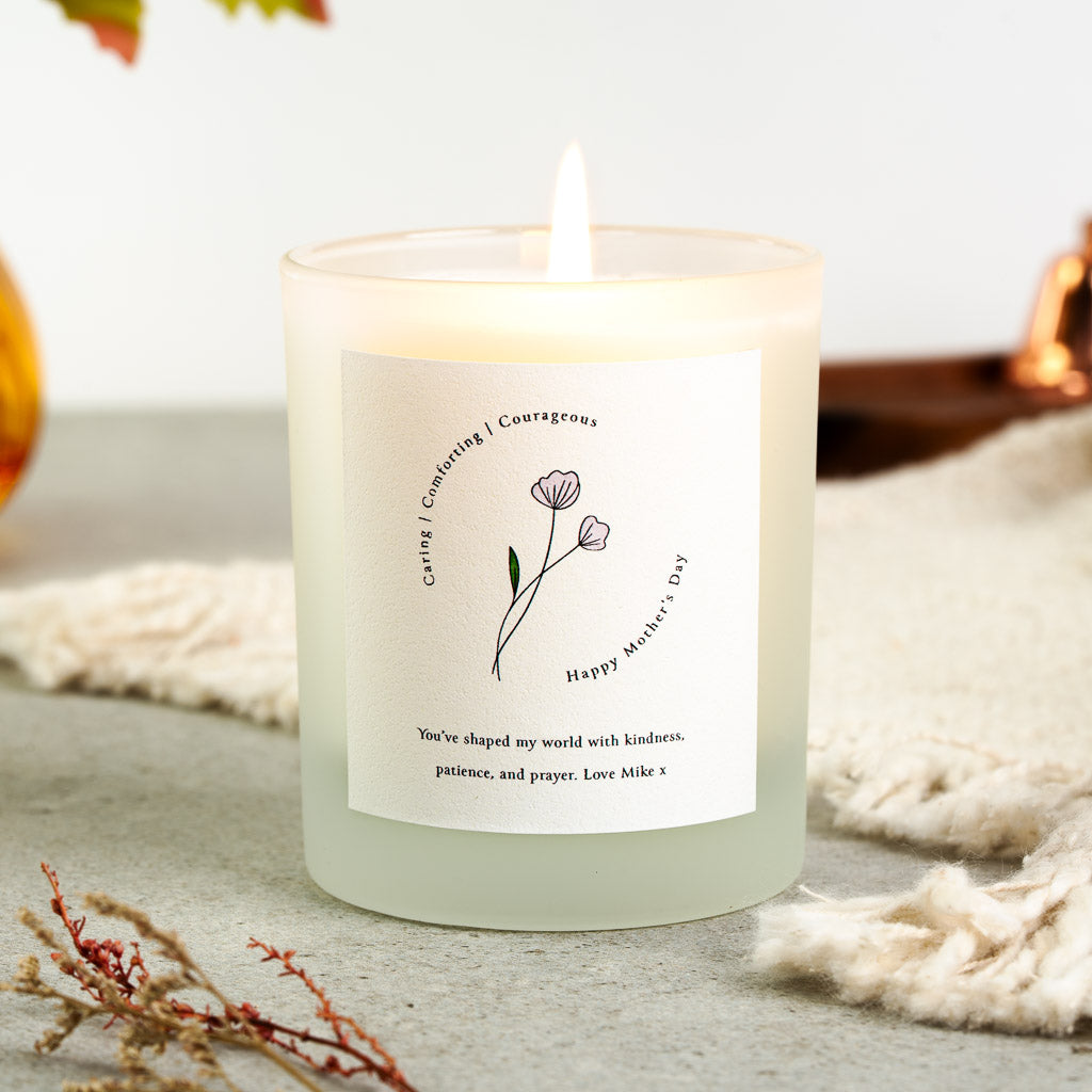 Three describing words arcing above a flower on a personalised Mother's Day candle label
