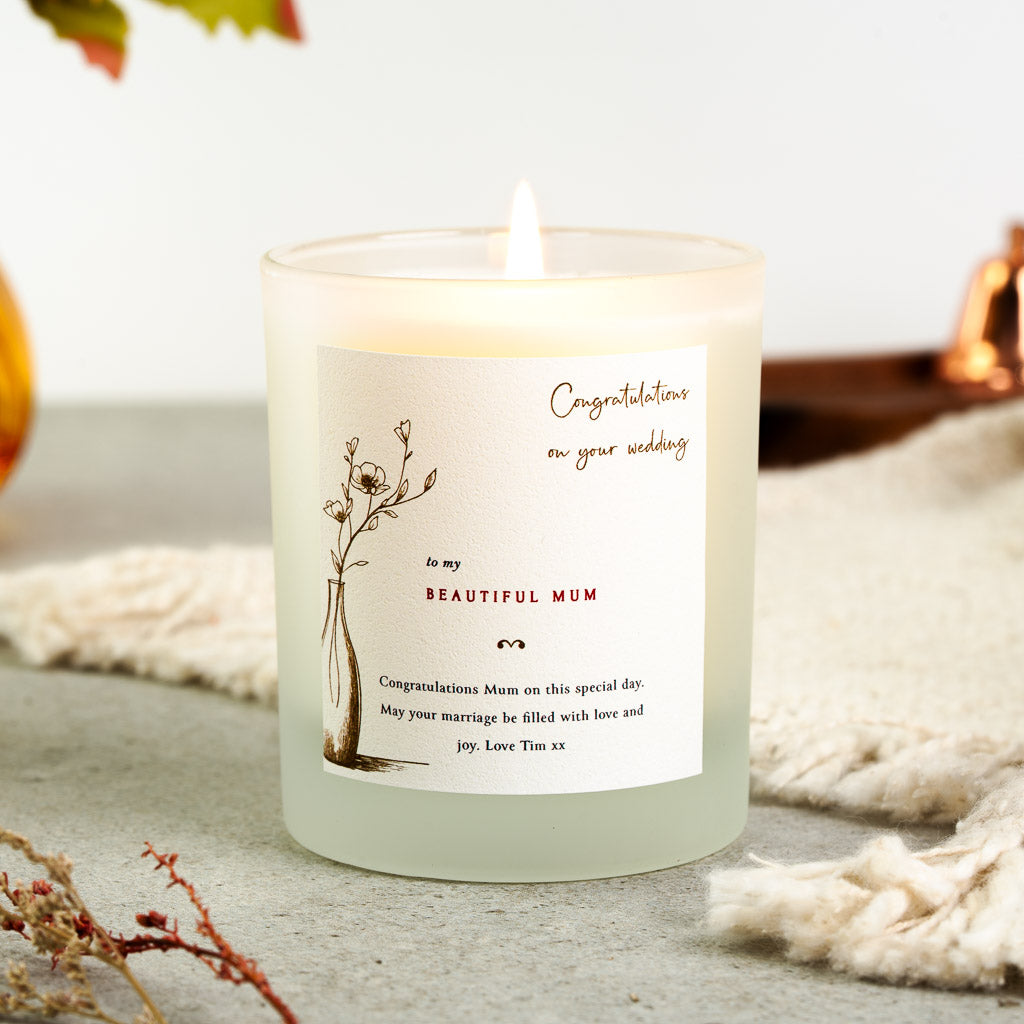 Floral vase illustration with the lettering set to one side on a personalised wedding candle