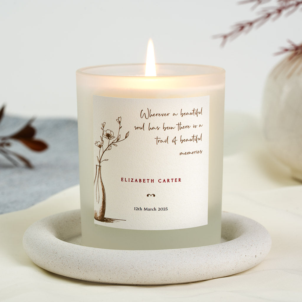 Personalised memorial candle with a remembrance line running across the top of the label
