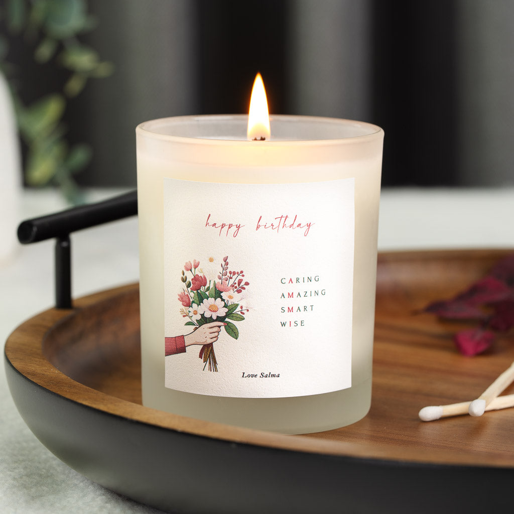 Personalised Islamic birthday candle with a hand holding pink and white flowers to one side