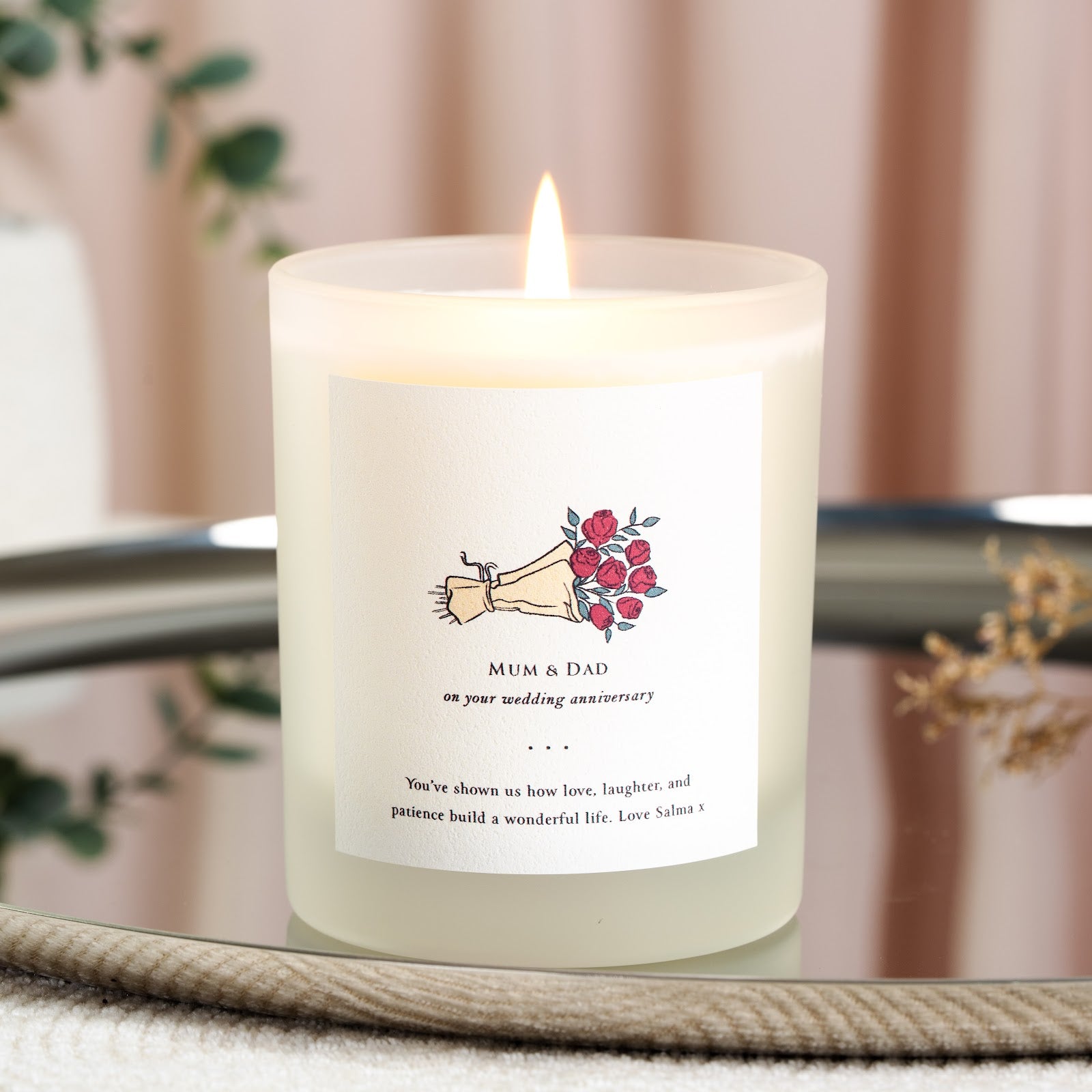 Bouquet illustration beneath the chosen relationship on a personalised anniversary candle