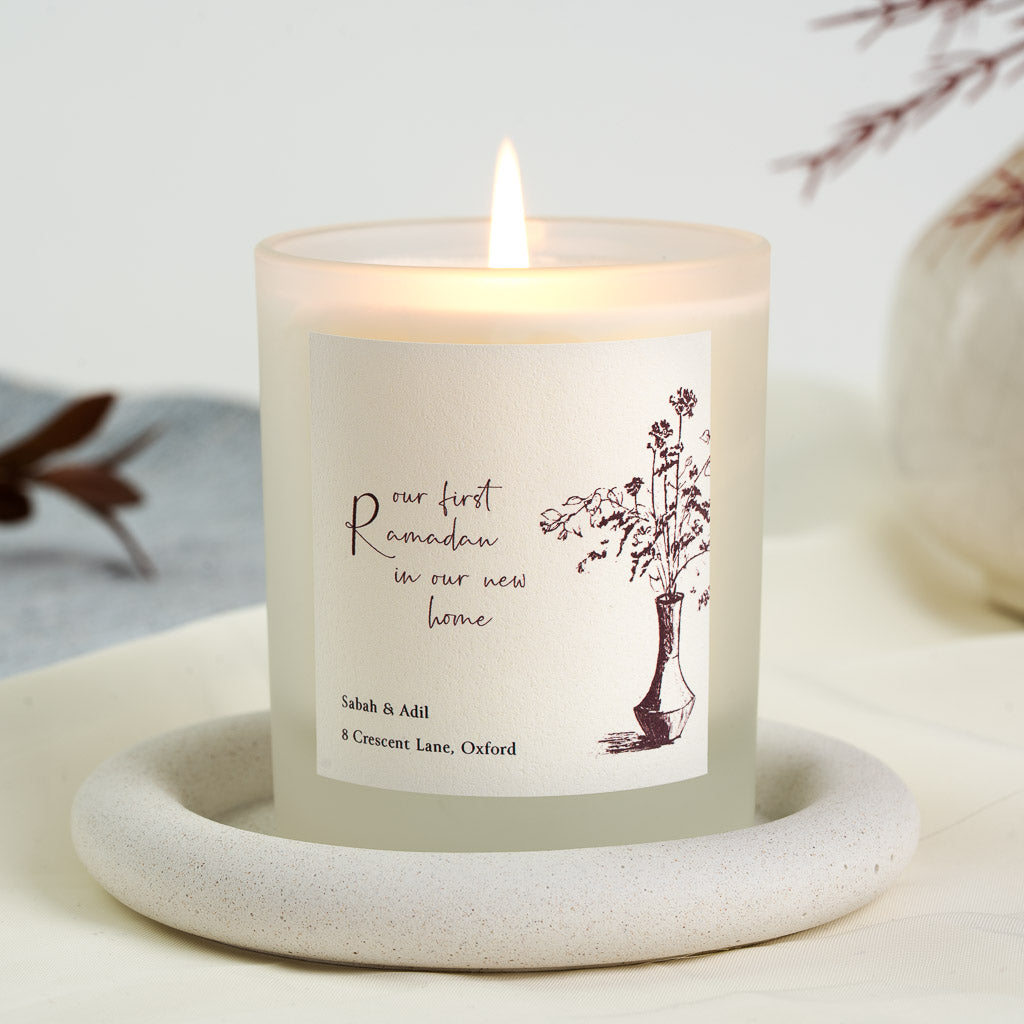 Personalised Ramadan candle with a flowing black script line on a soft white label