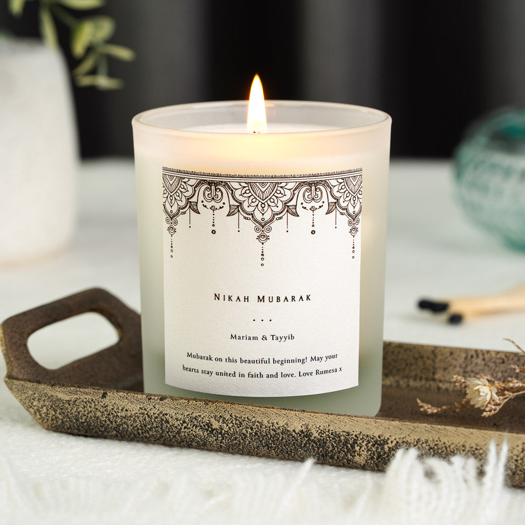 Detailed mandala pattern in dark brown ink across a personalised nikah mubarak candle