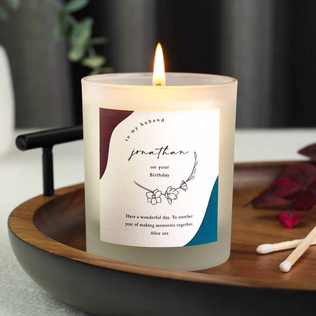 Curved relationship line above the name in script on a personalised birthday candle