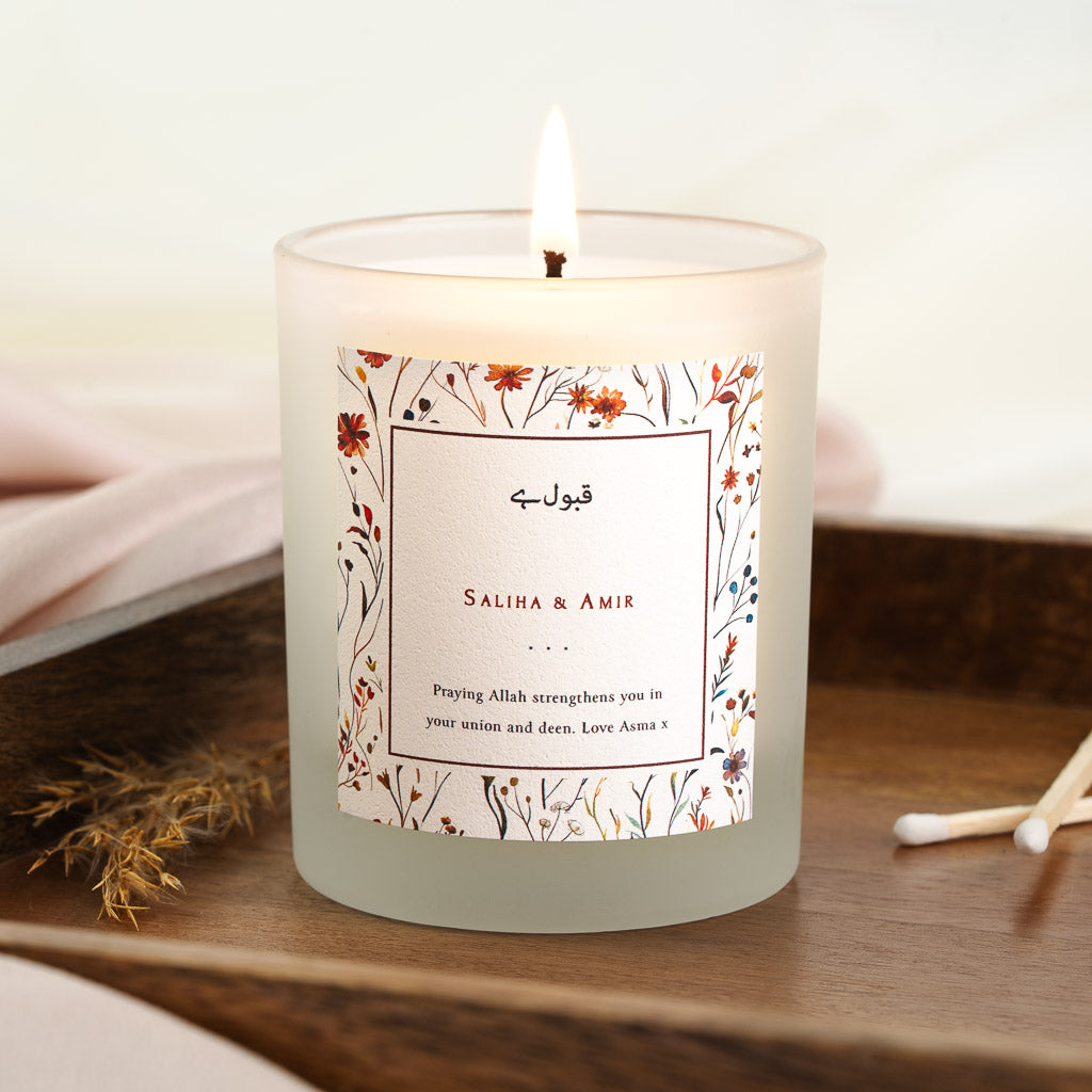 Personalised nikah candle with rust and ochre florals trailing around a thin-bordered box