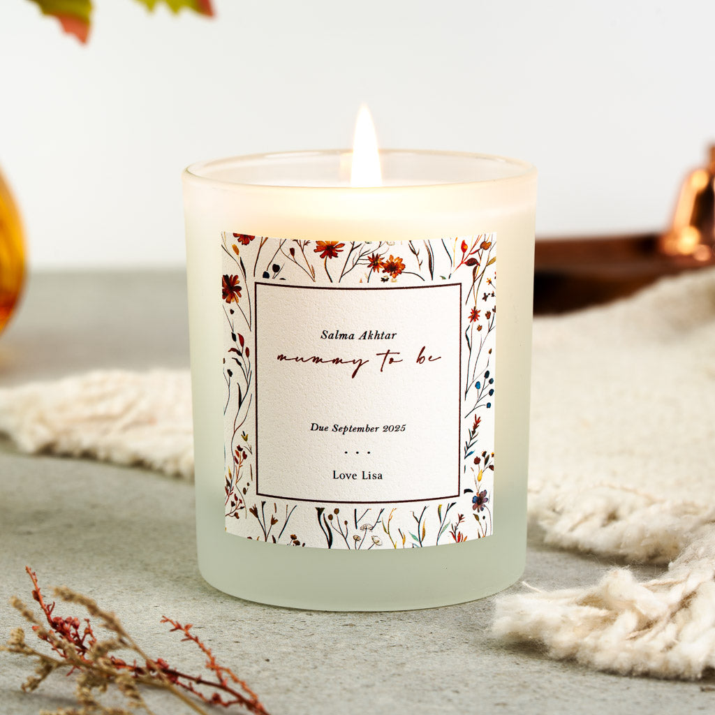 Personalised mummy to be candle with autumnal wildflowers bordering a thin square frame