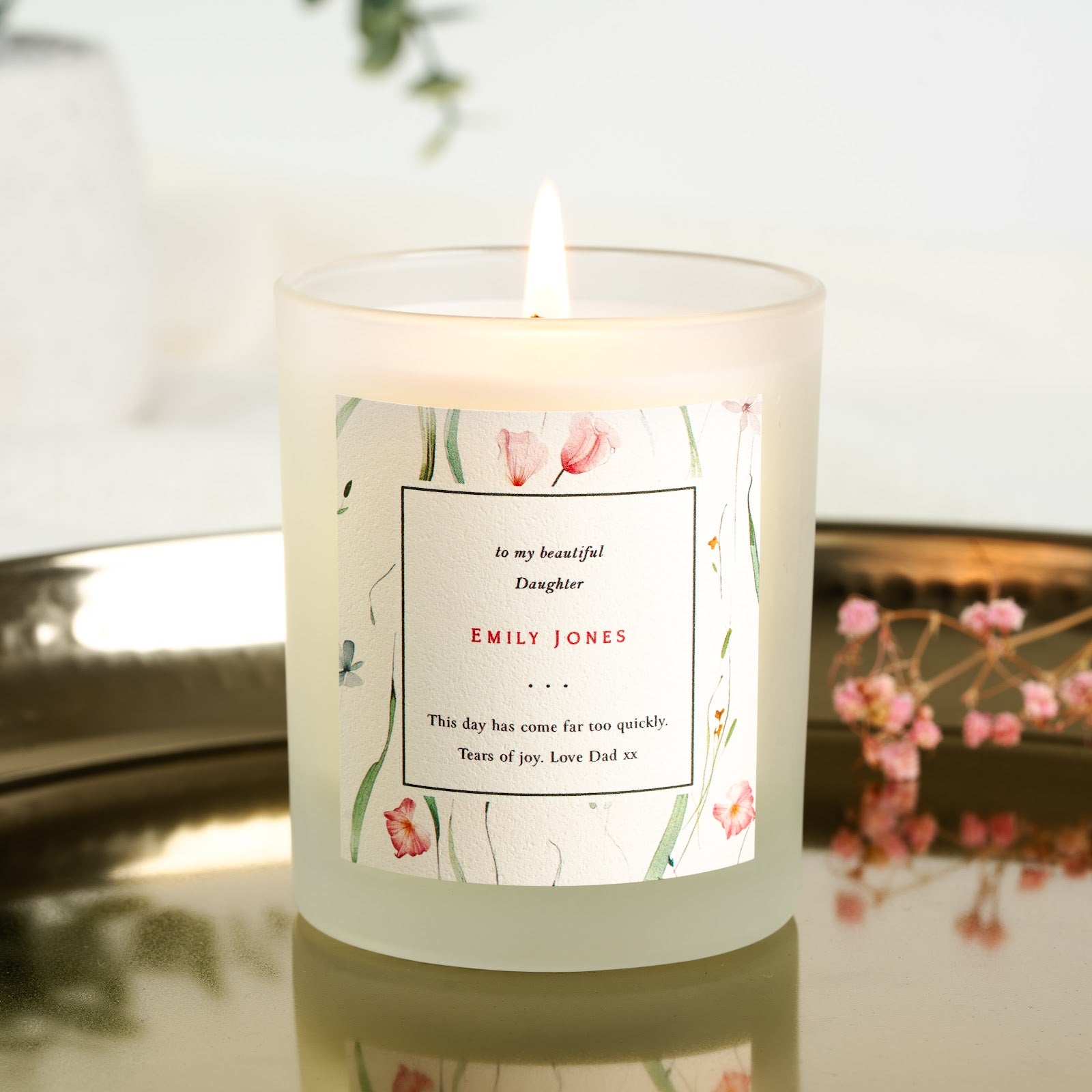 Personalised wedding candle with a boxed panel framed by pink and green florals