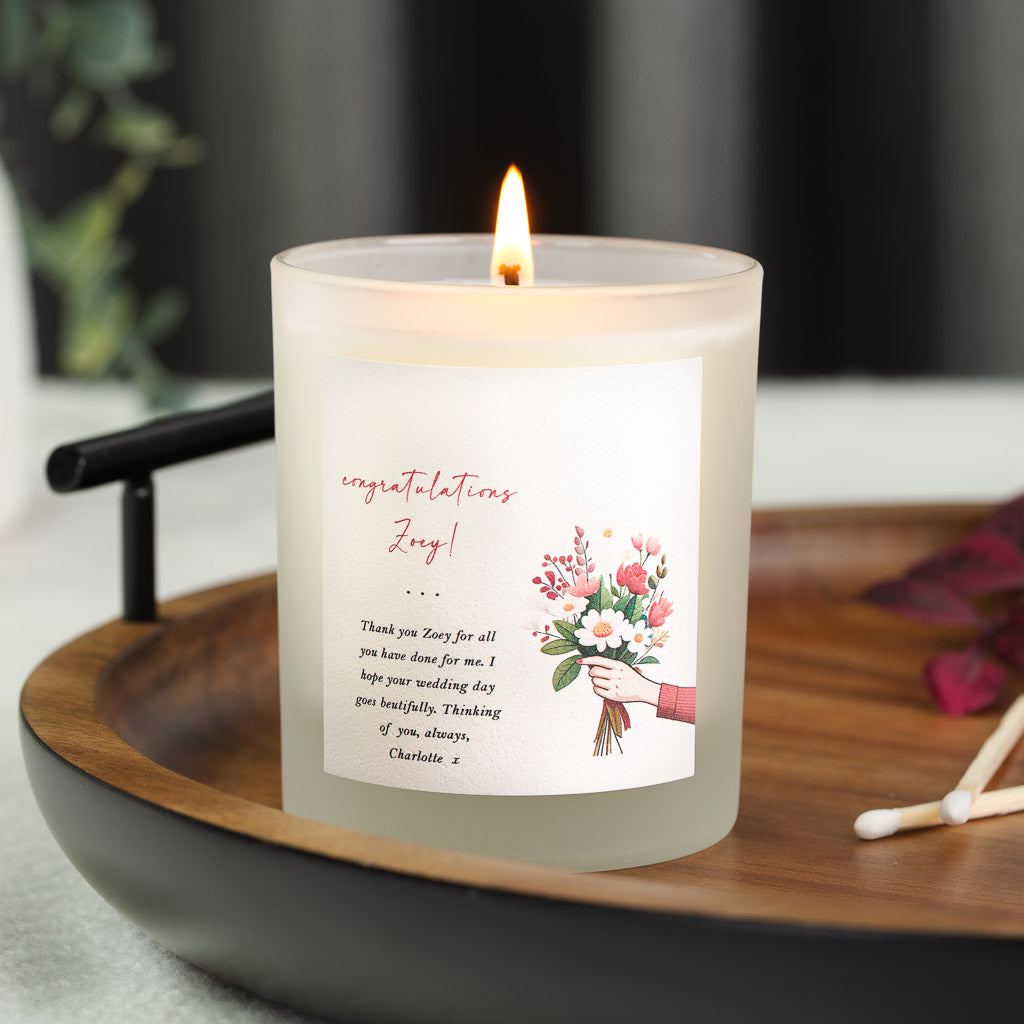 Personalised wedding candle with congratulations in red cursive above the recipient's name