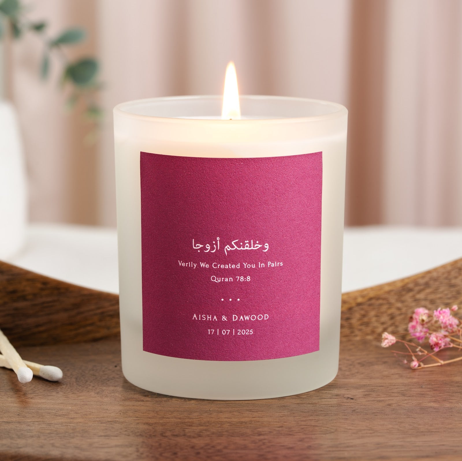 Personalised nikah candle with Surah An-Naba in white Arabic script above its translation