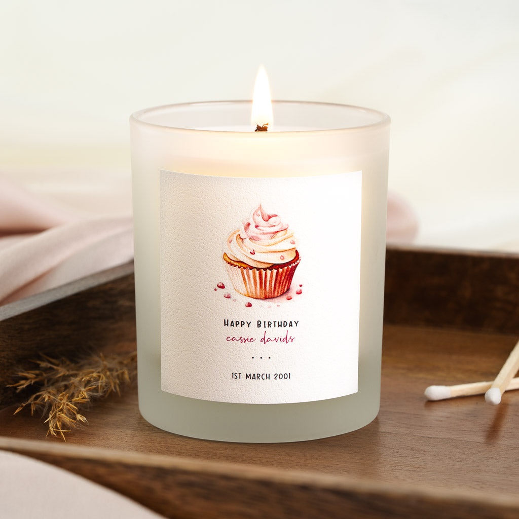 Personalised birthday candle with a painted cupcake above the script greeting