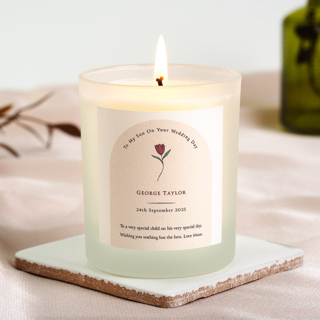 Personalised wedding candle with a tulip illustration framed by an arch shape