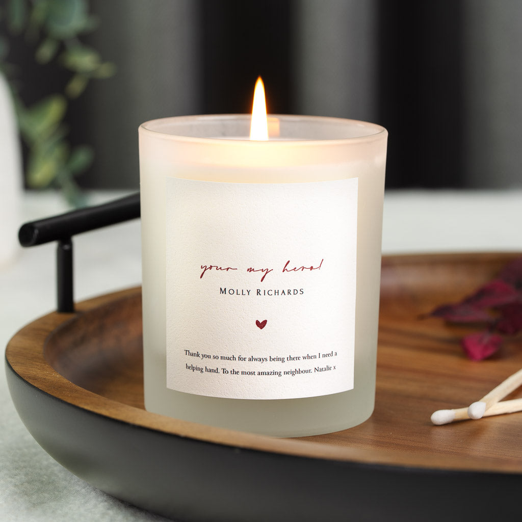 Red script above a small heart on a personalised thank you candle label