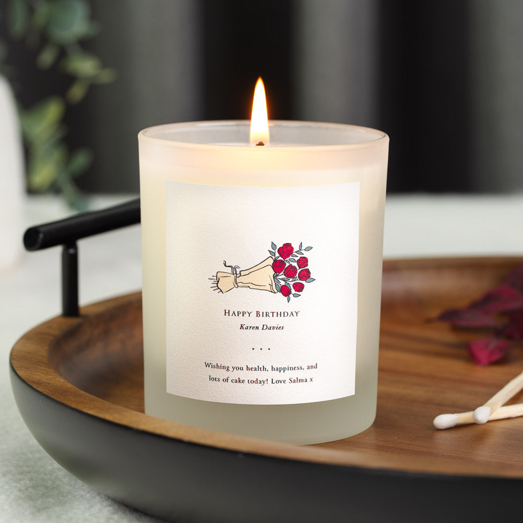 Personalised birthday candle with a rose bouquet illustration above the occasion line