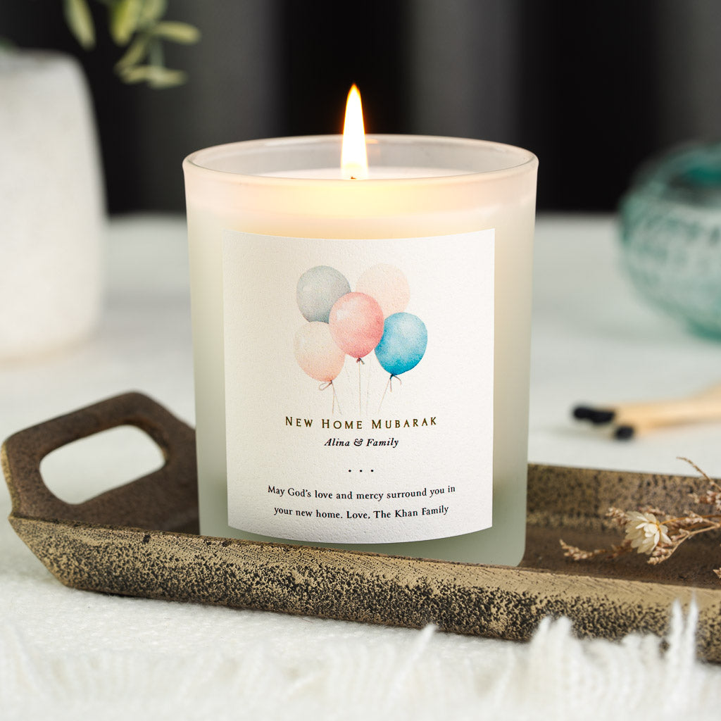 Personalised Islamic new home candle with five balloons in soft blue, pink and cream