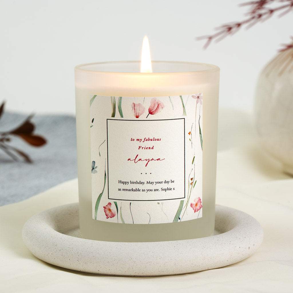 Personalised birthday candle with a loose watercolour floral border around a bordered box