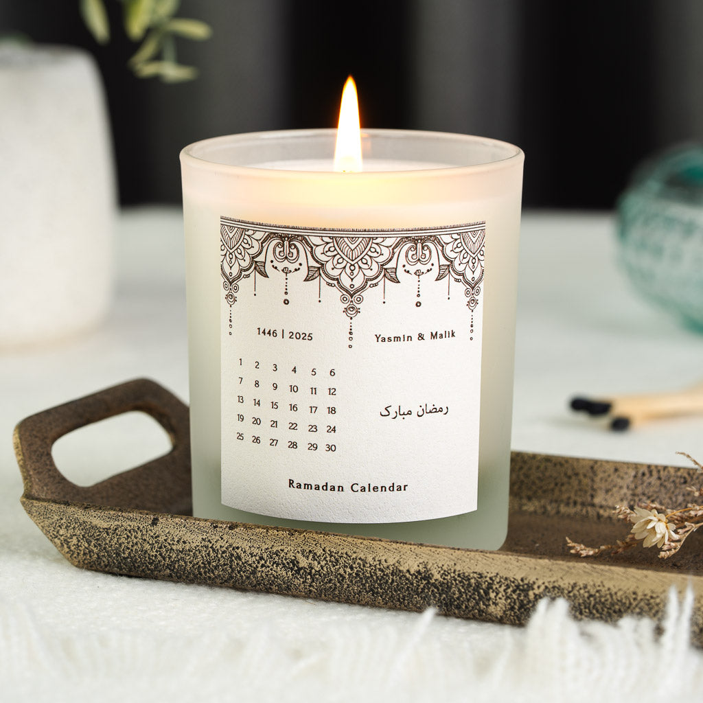 Mandala-style lace pattern above a grid of days on a personalised Ramadan candle label