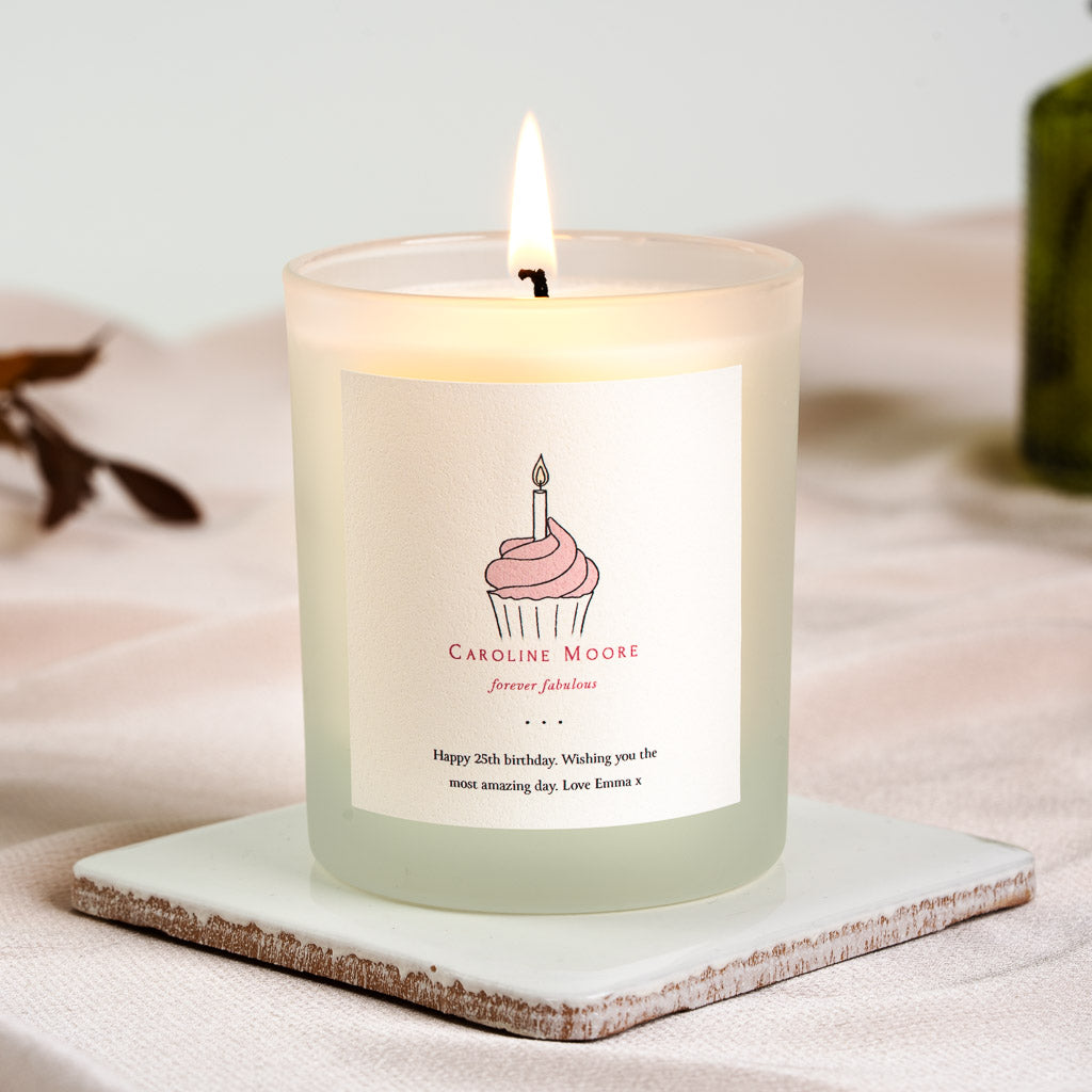 Cupcake illustration above forever fabulous in red script on a personalised birthday candle