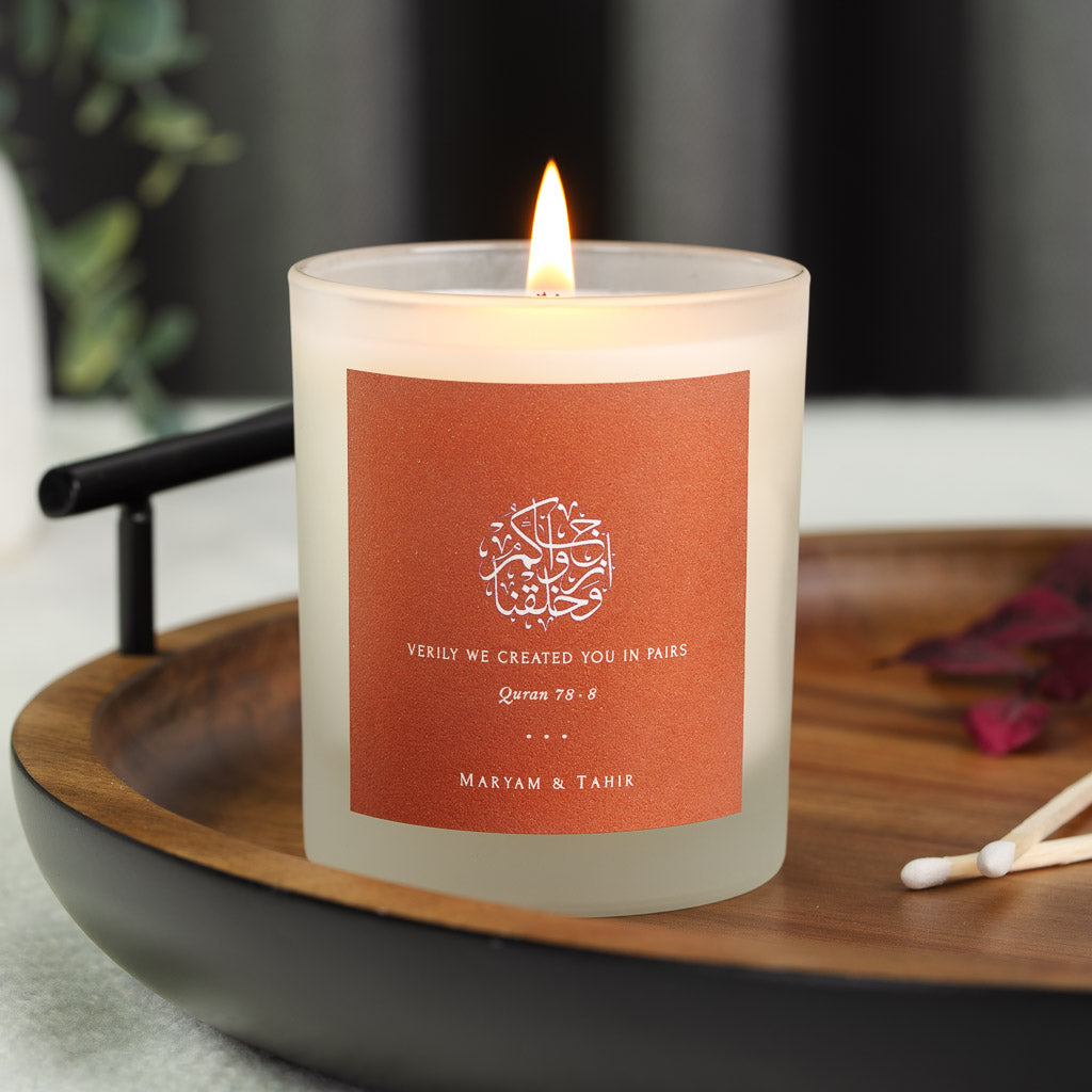 Personalised nikah candle with circular calligraphy of Surah An-Naba above its translation