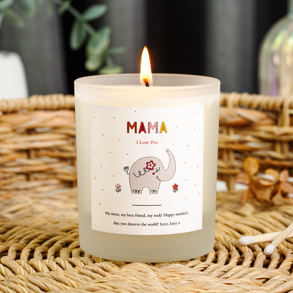 Personalised Mother's Day candle with a playful elephant in warm reds and ochre