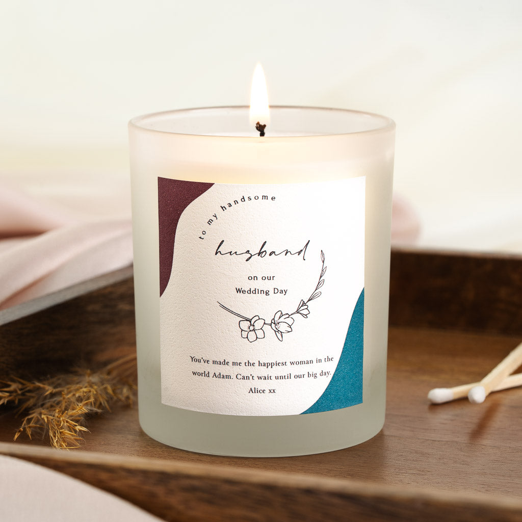 Personalised wedding candle with maroon and teal colour blocks and flowing script