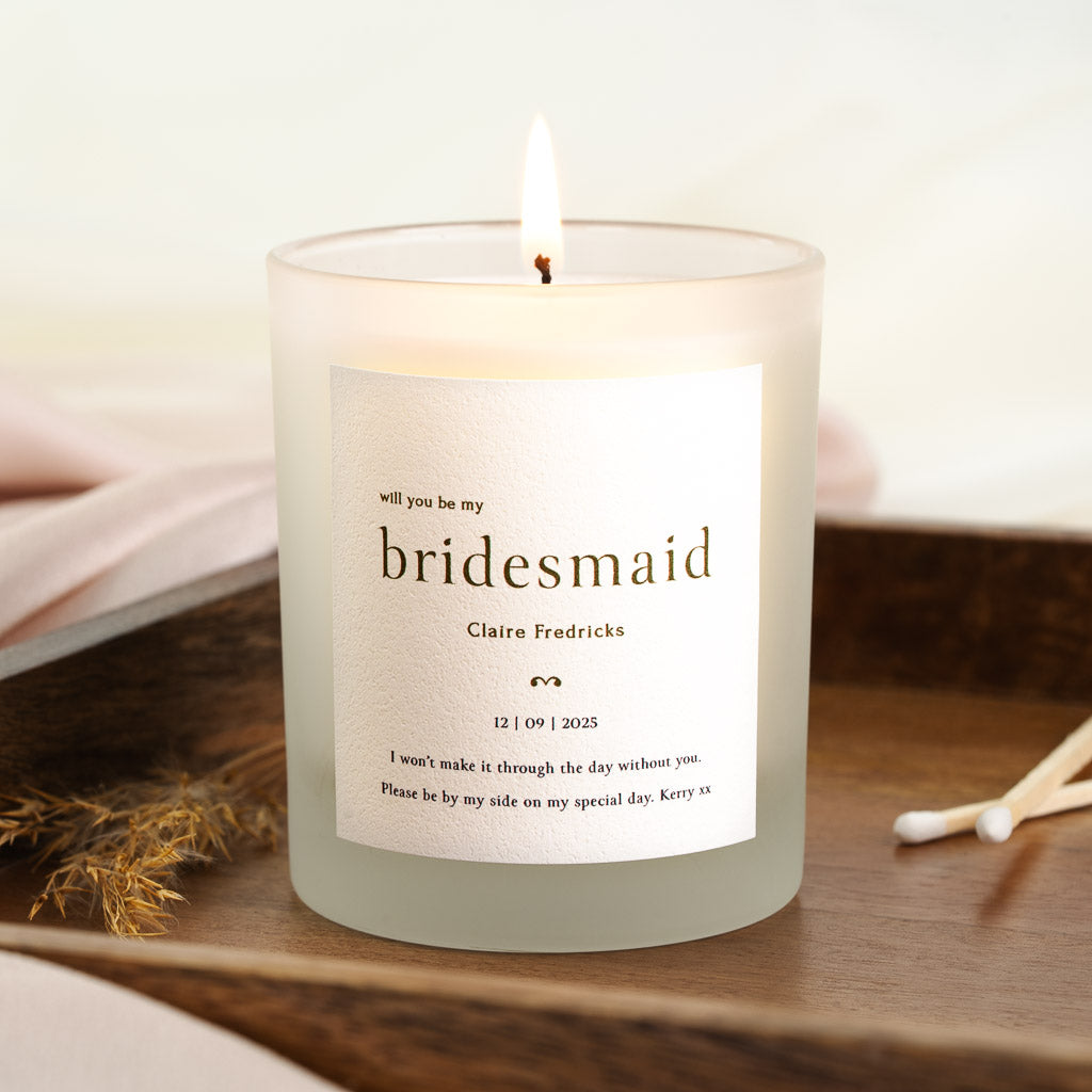 Bold lowercase bridesmaid lettering in classic typography on a personalised candle label