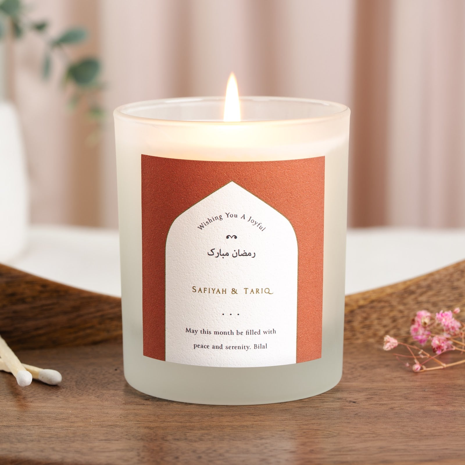 Personalised Ramadan candle with a soft white inset inside a solid terracotta arch
