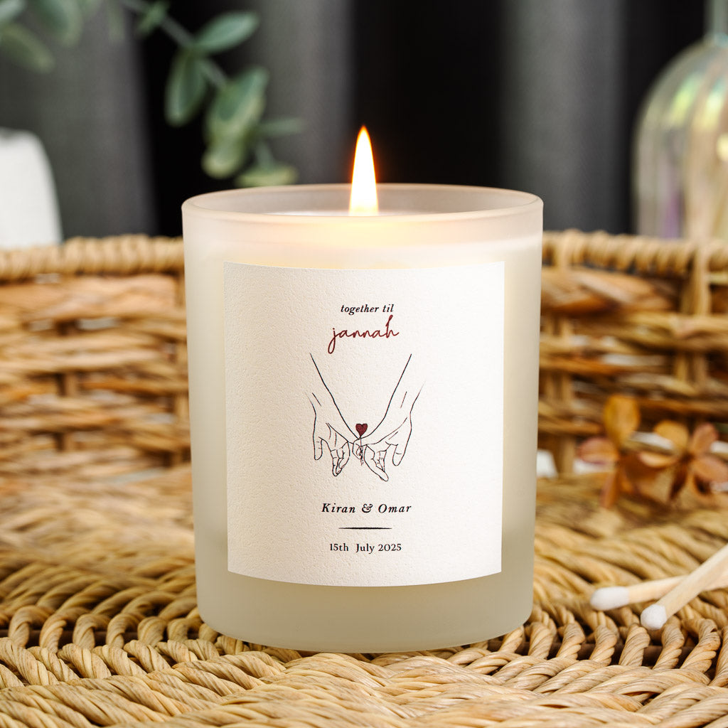 Personalised Islamic anniversary candle with two hands meeting beneath a red script heading