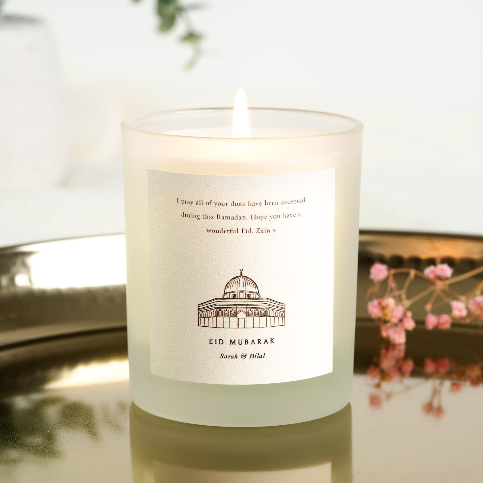 Personalised Eid candle with a line-drawn domed building with arched windows