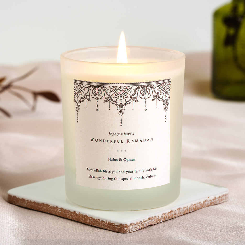 Mandala-style lace pattern in black ink across a personalised Ramadan candle label