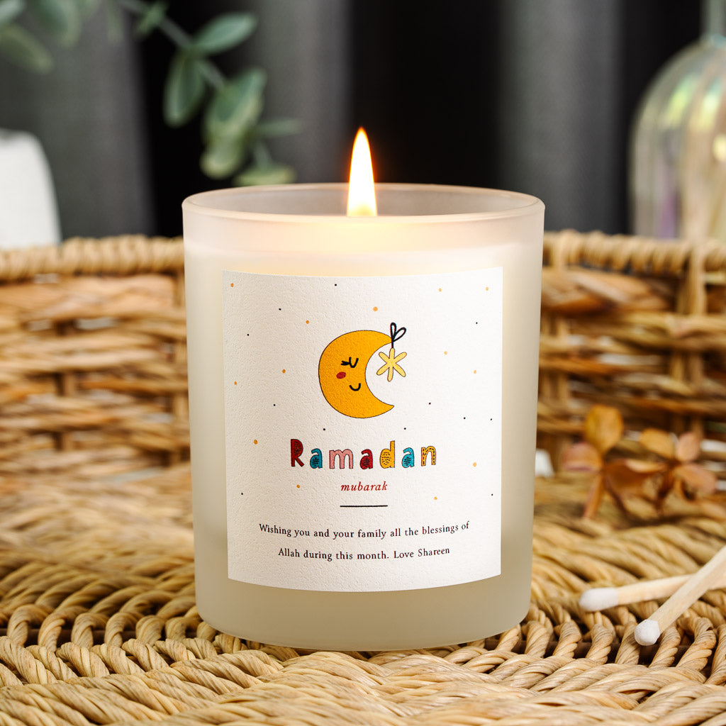 Personalised Ramadan candle with a smiling crescent moon and a small hanging star