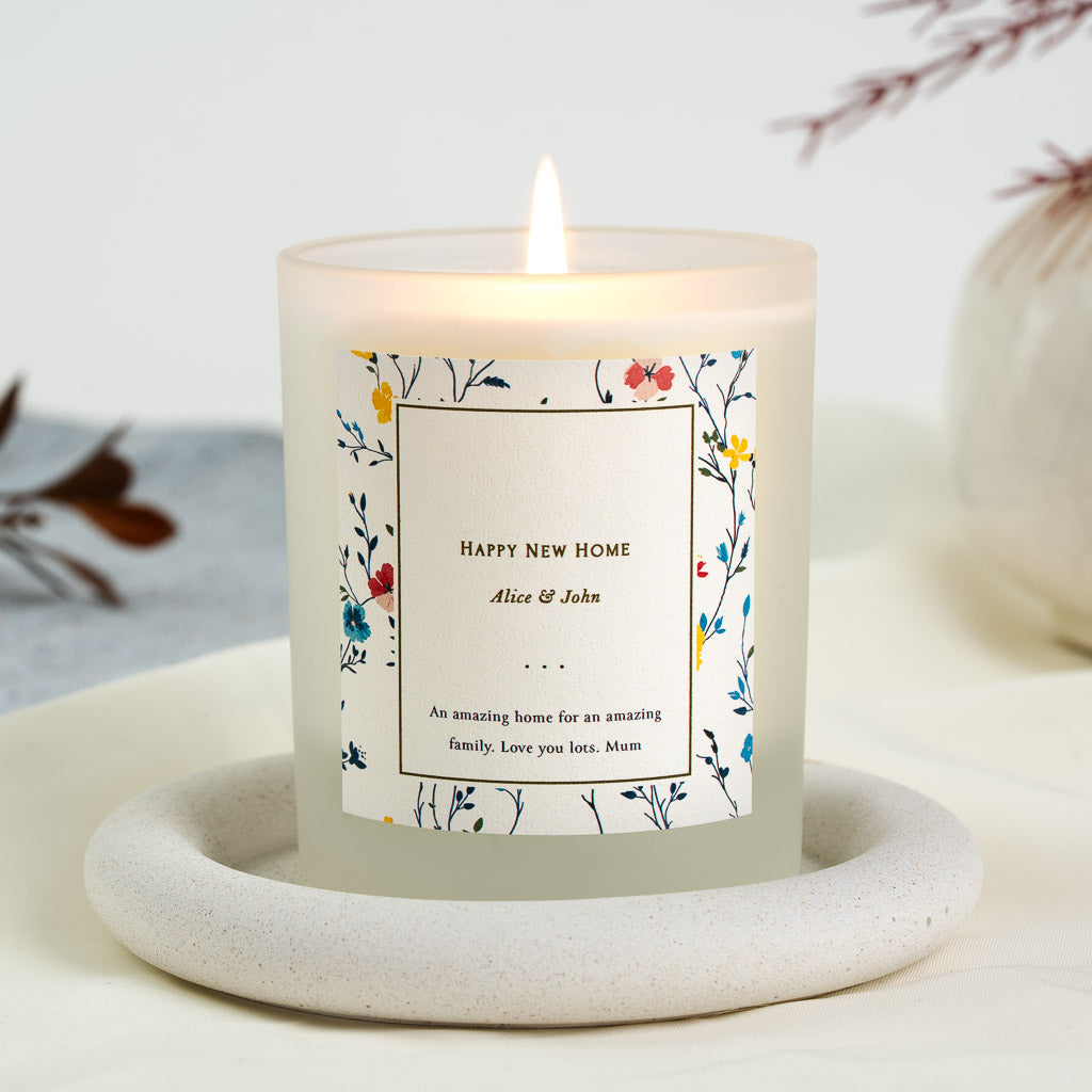 Thin-lined box holding a new home greeting on a personalised Islamic housewarming candle