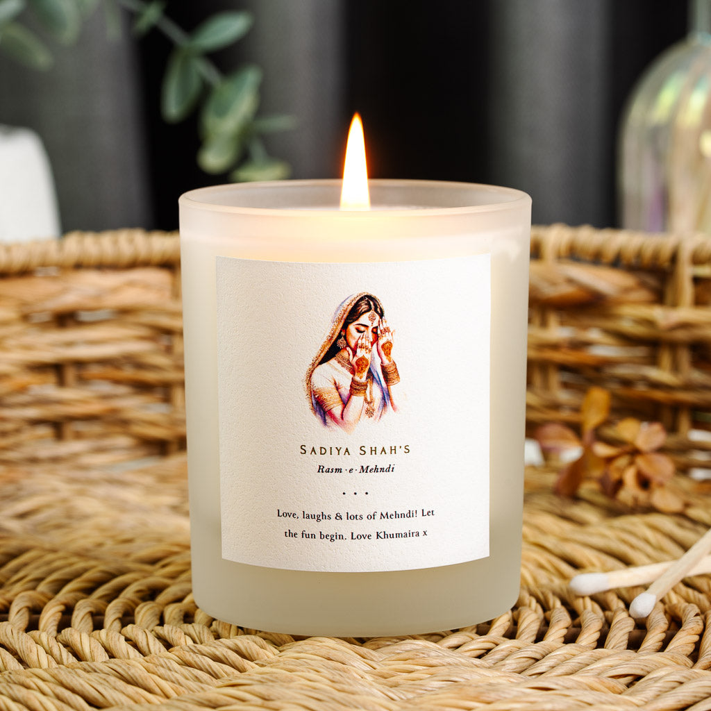 Watercolour bride in a headscarf with hennaed hands raised on a personalised mehndi candle