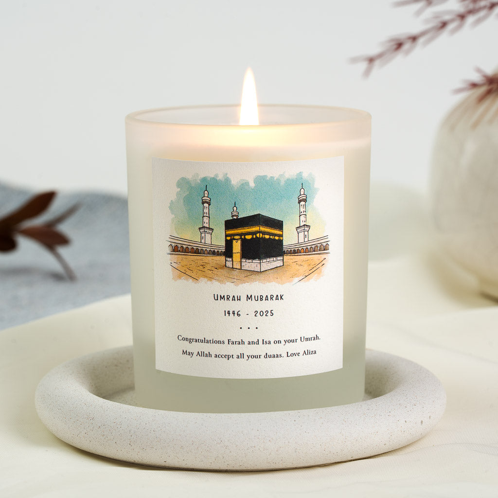 Watercolour Kaaba and courtyard above the greeting on a personalised Umrah candle