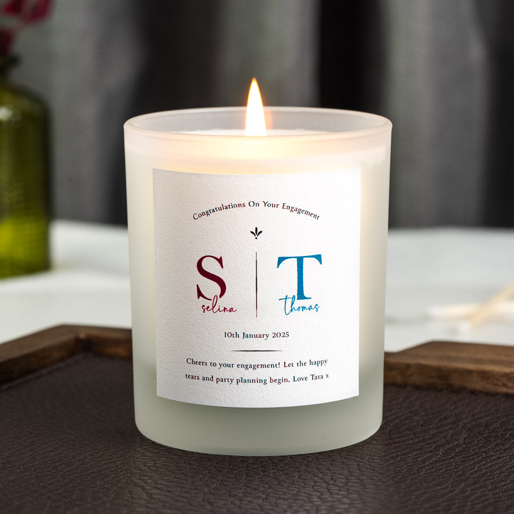 Personalised engagement candle with the couple's initials set in contrasting colours