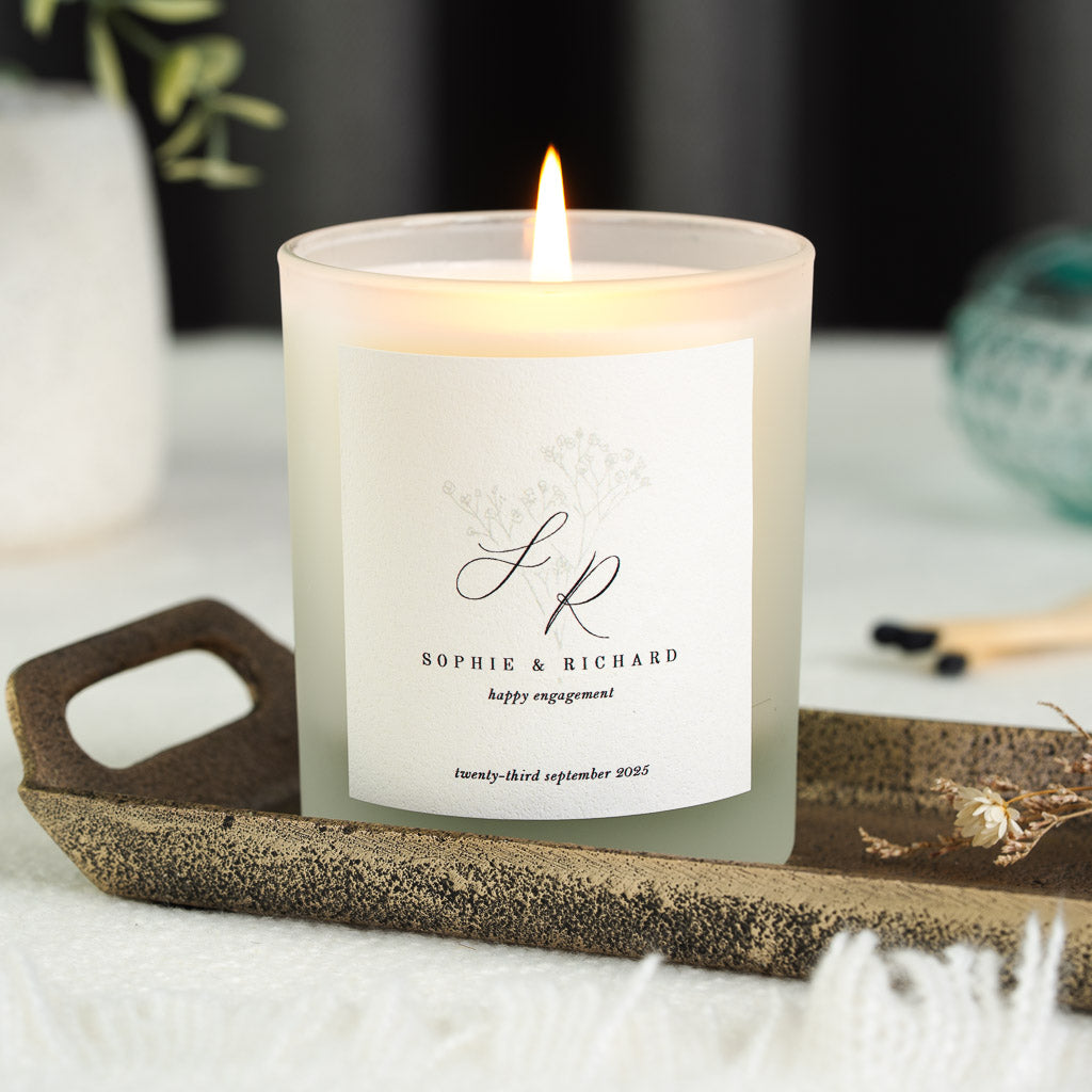 Personalised engagement candle with monogram initials above the couple's names