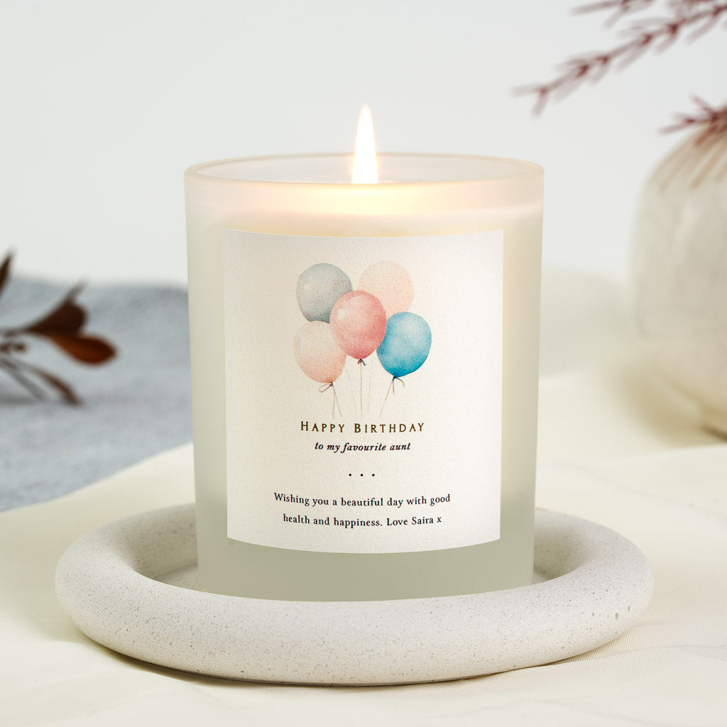 Pastel balloon illustration above the chosen relationship on a personalised birthday candle