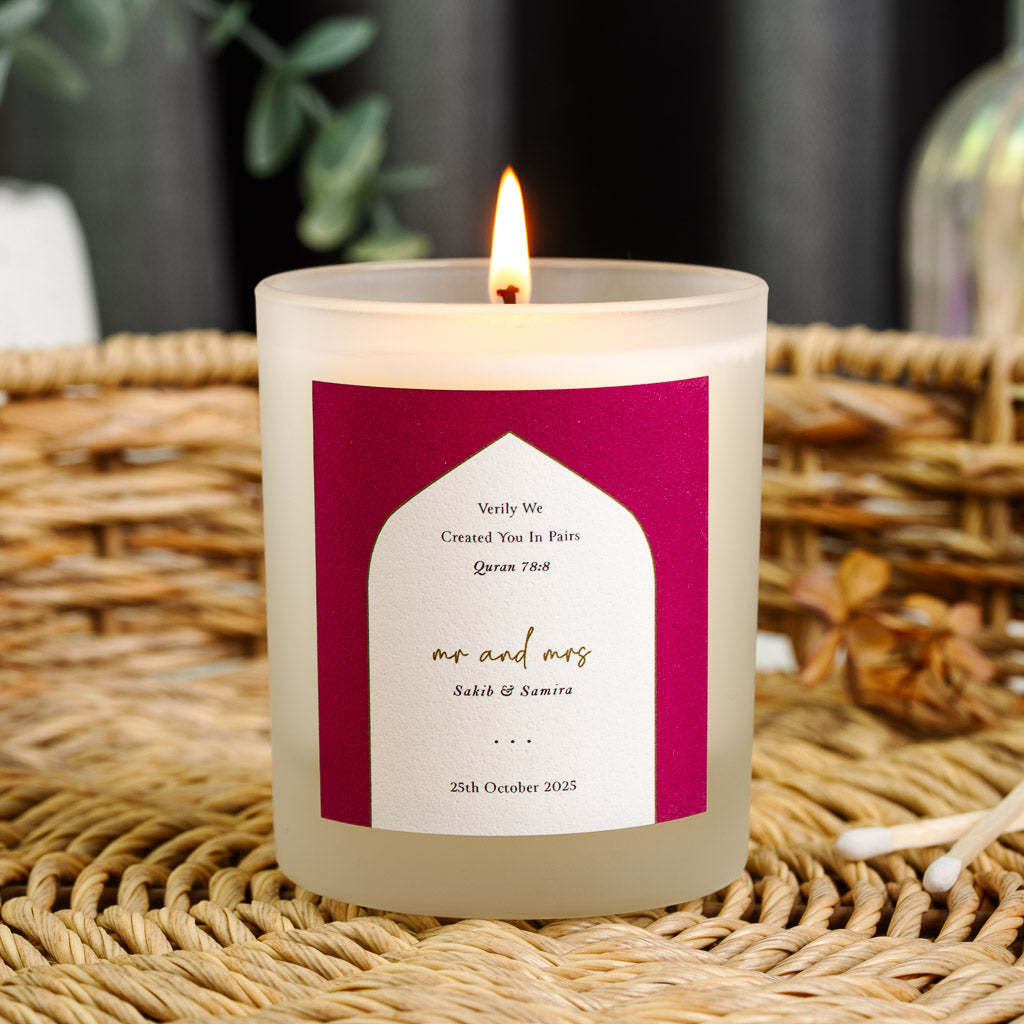 Personalised Islamic wedding candle with a white arch on magenta holding a Quran verse