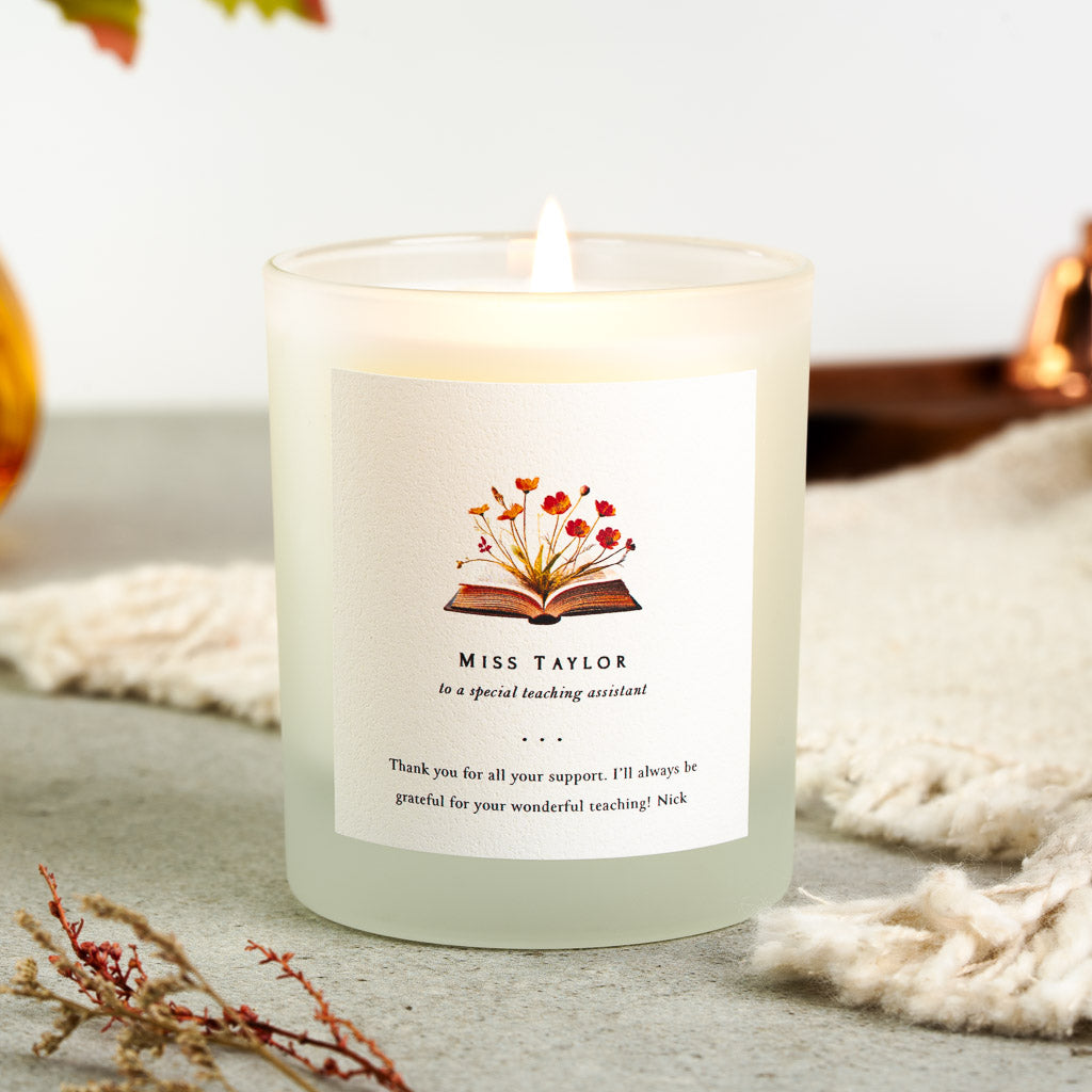 Personalised teaching assistant candle with wildflowers blooming from an open book