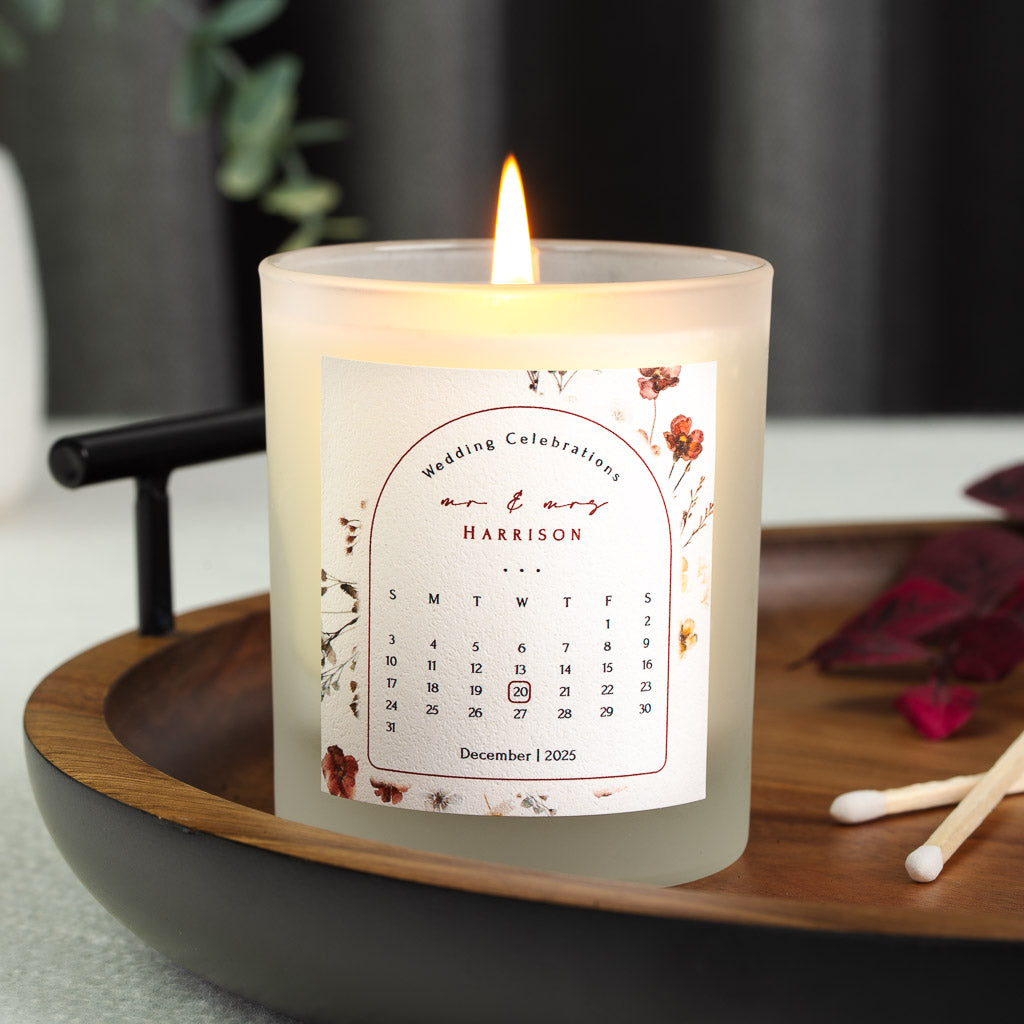 Personalised wedding candle with an arched panel and a month calendar marking the wedding date