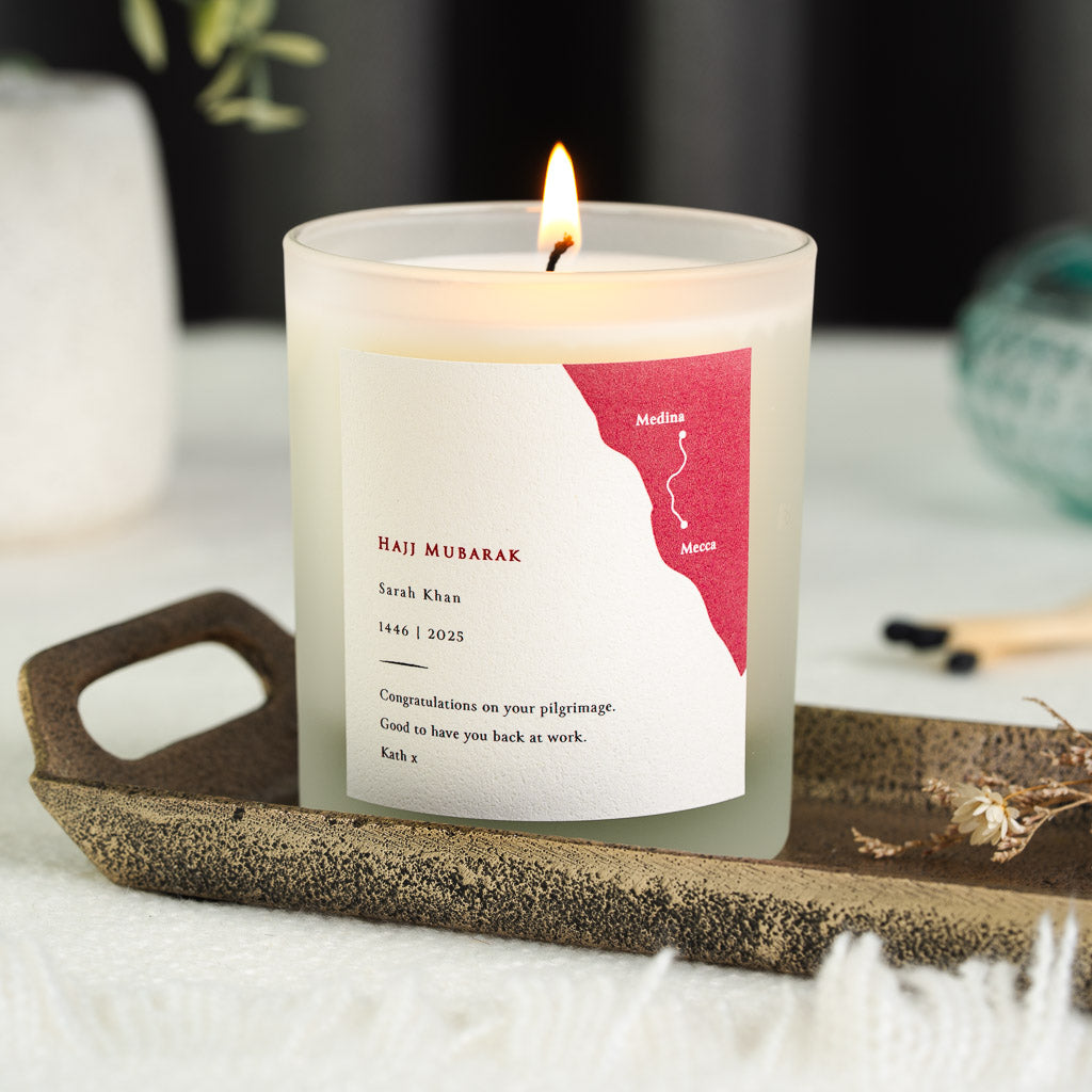 Personalised Hajj candle with a red map panel marking Medina and Mecca